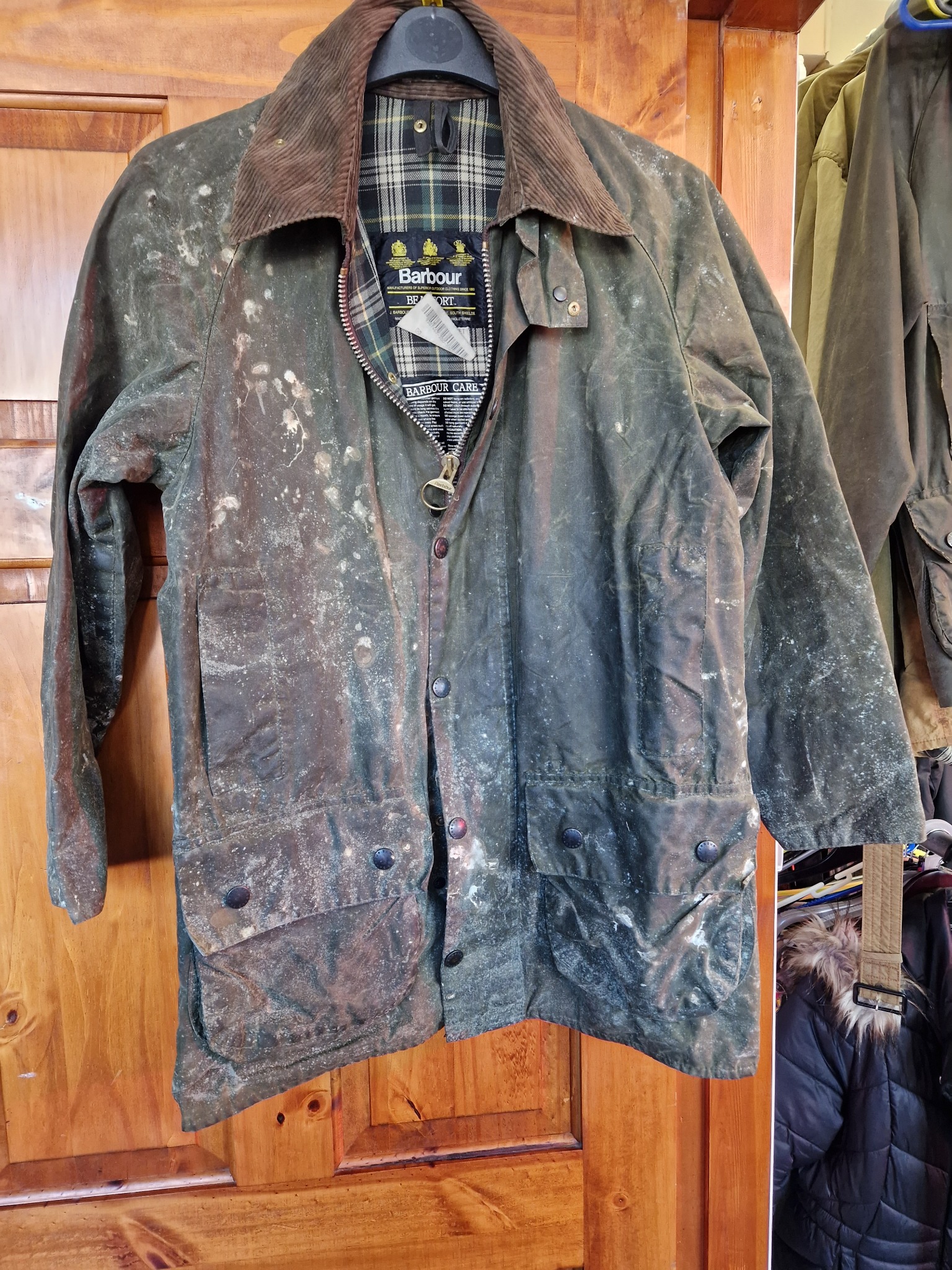 Mouldy or badly stored Barbour jacket before specialist treatment