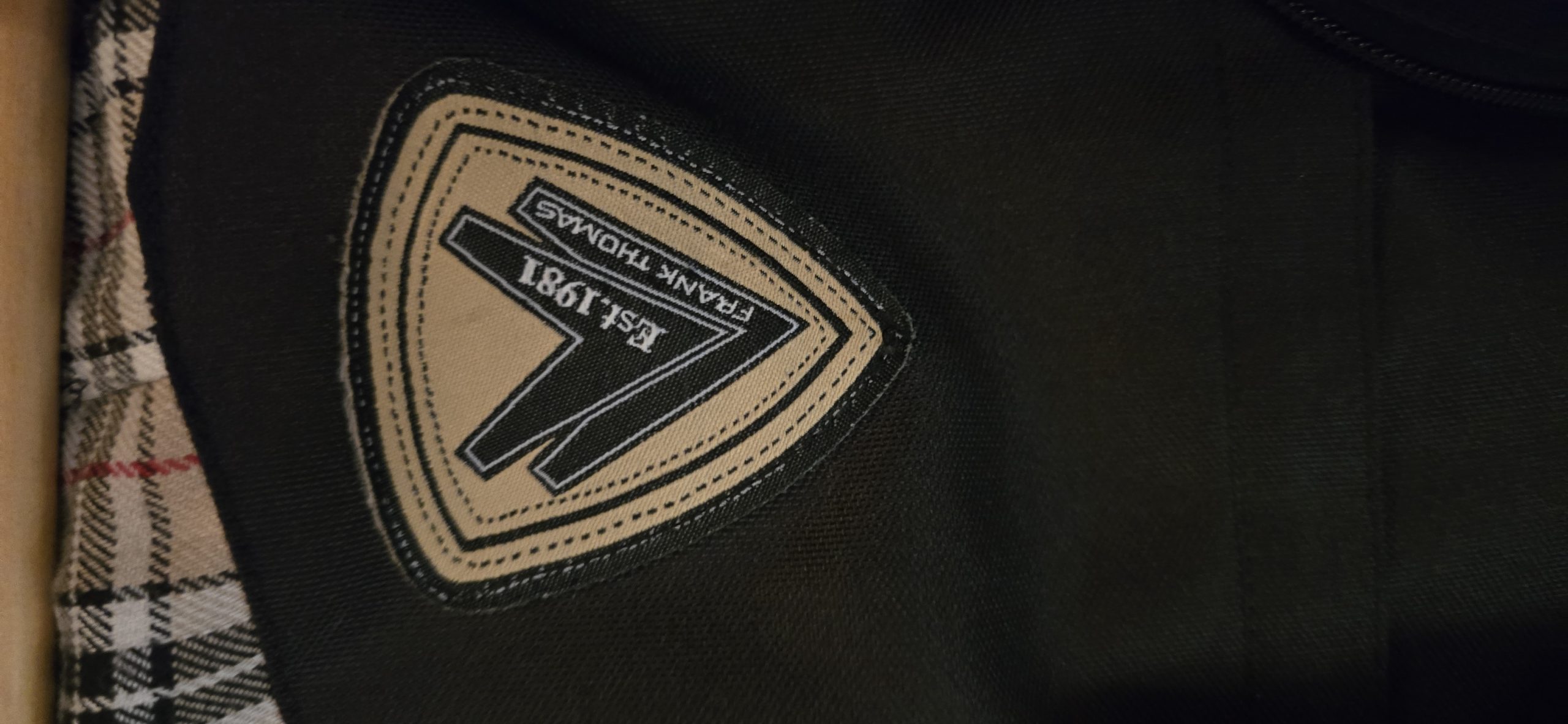Frank Thomas motorcycle jacket label photographed by Wax Jackets Cleaned