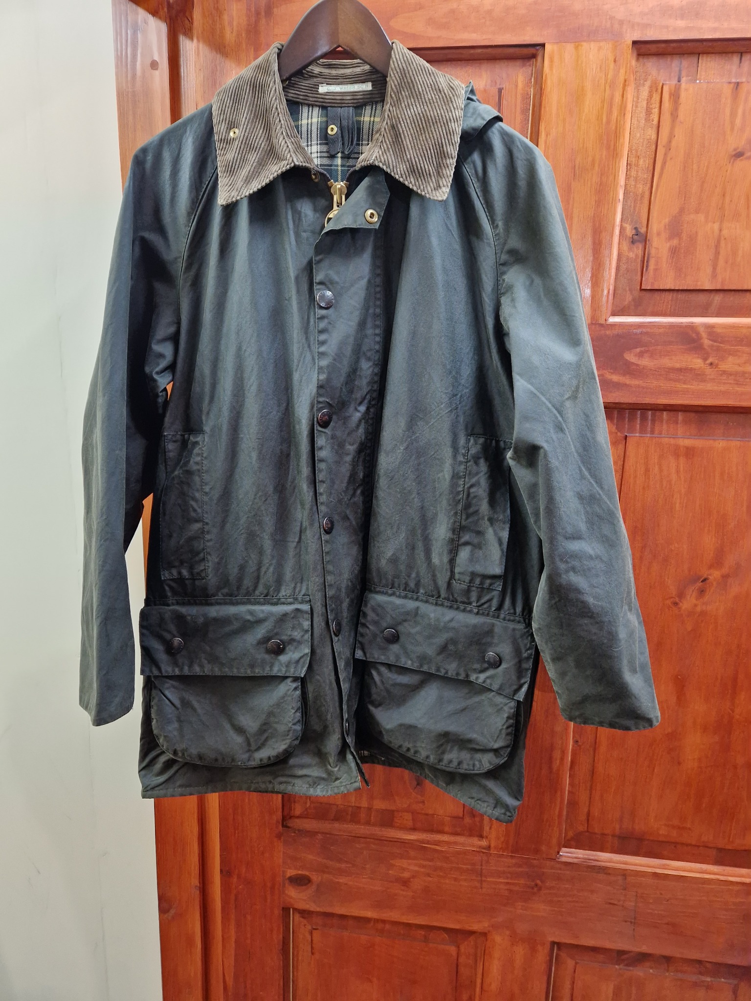 Barbour jacket after mould and odour treatment and hand re-waxing