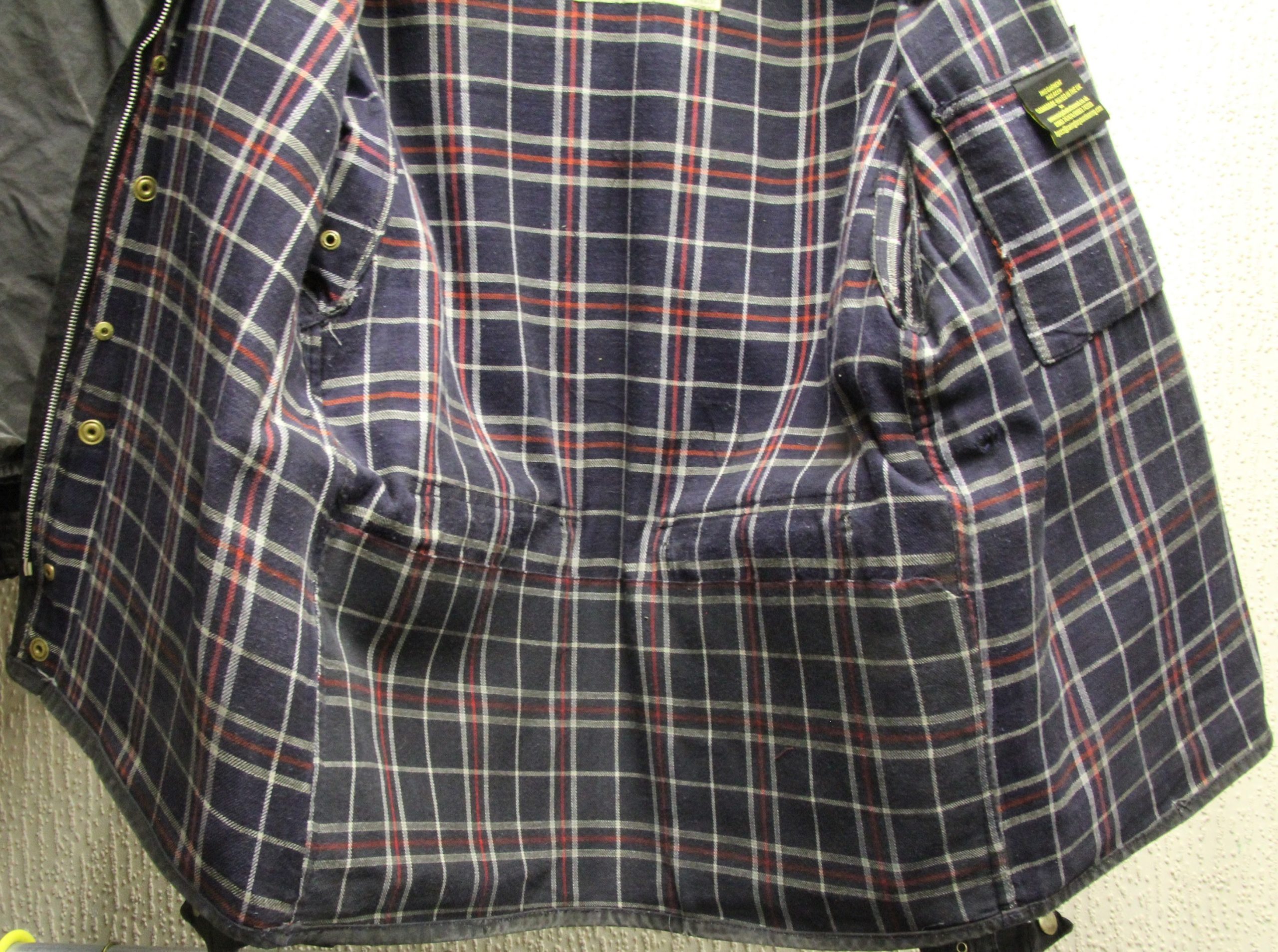 Restored Barbour wax jacket after specialist cleaning and hand re-waxing