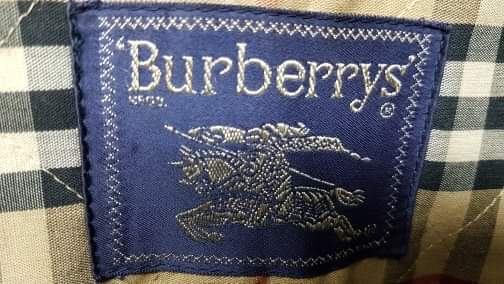Burberry jacket label photographed on a garment worked on by Wax Jackets Cleaned