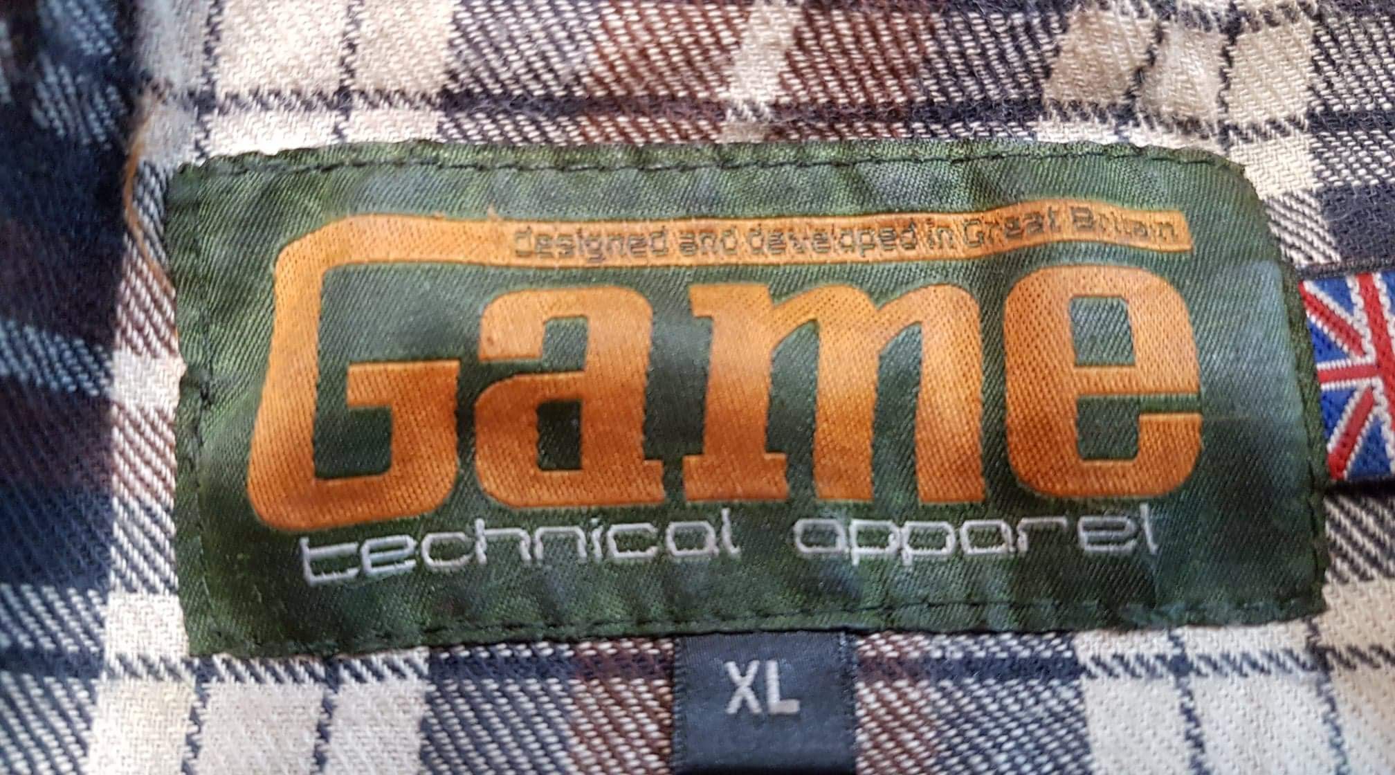 Game Technical Apparel jacket label photographed by Wax Jackets Cleaned