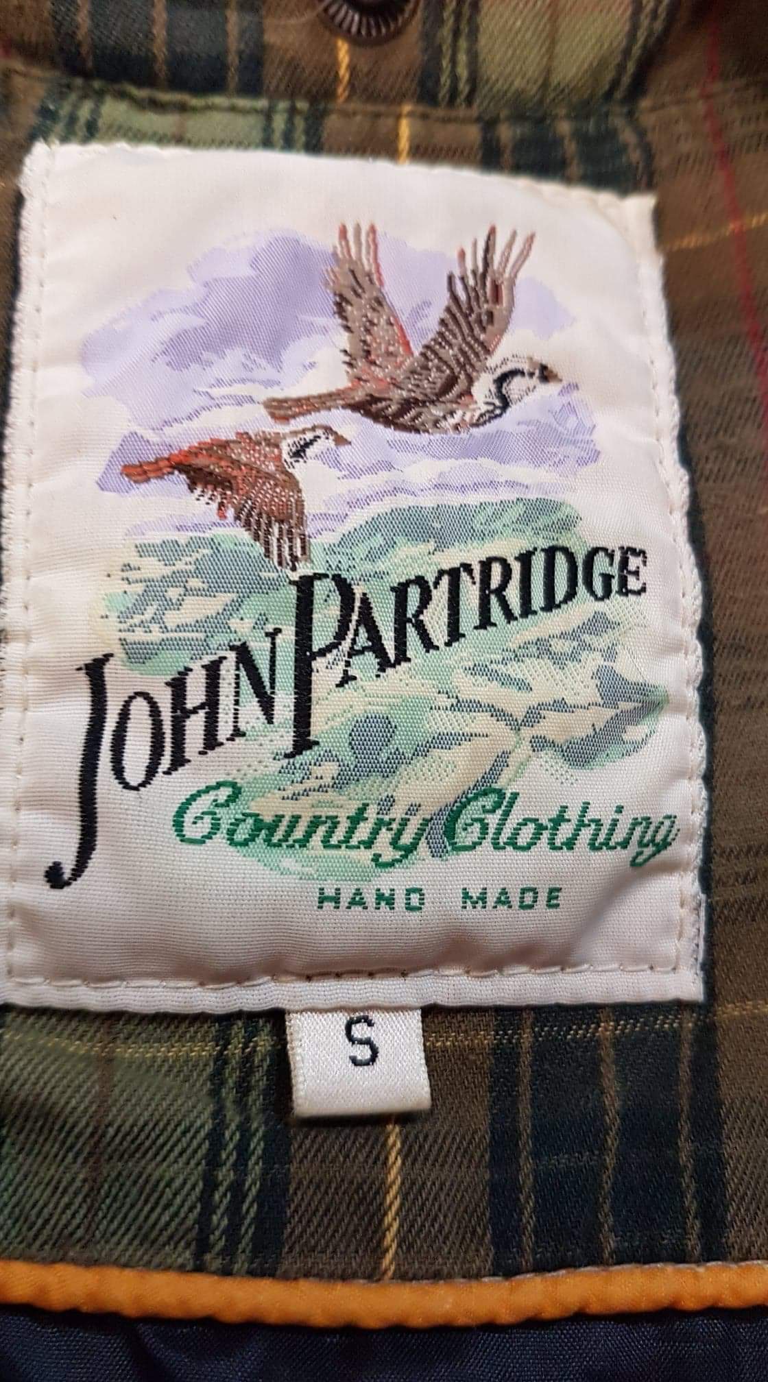 John Partridge Country Clothing jacket label photographed by Wax Jackets Cleaned