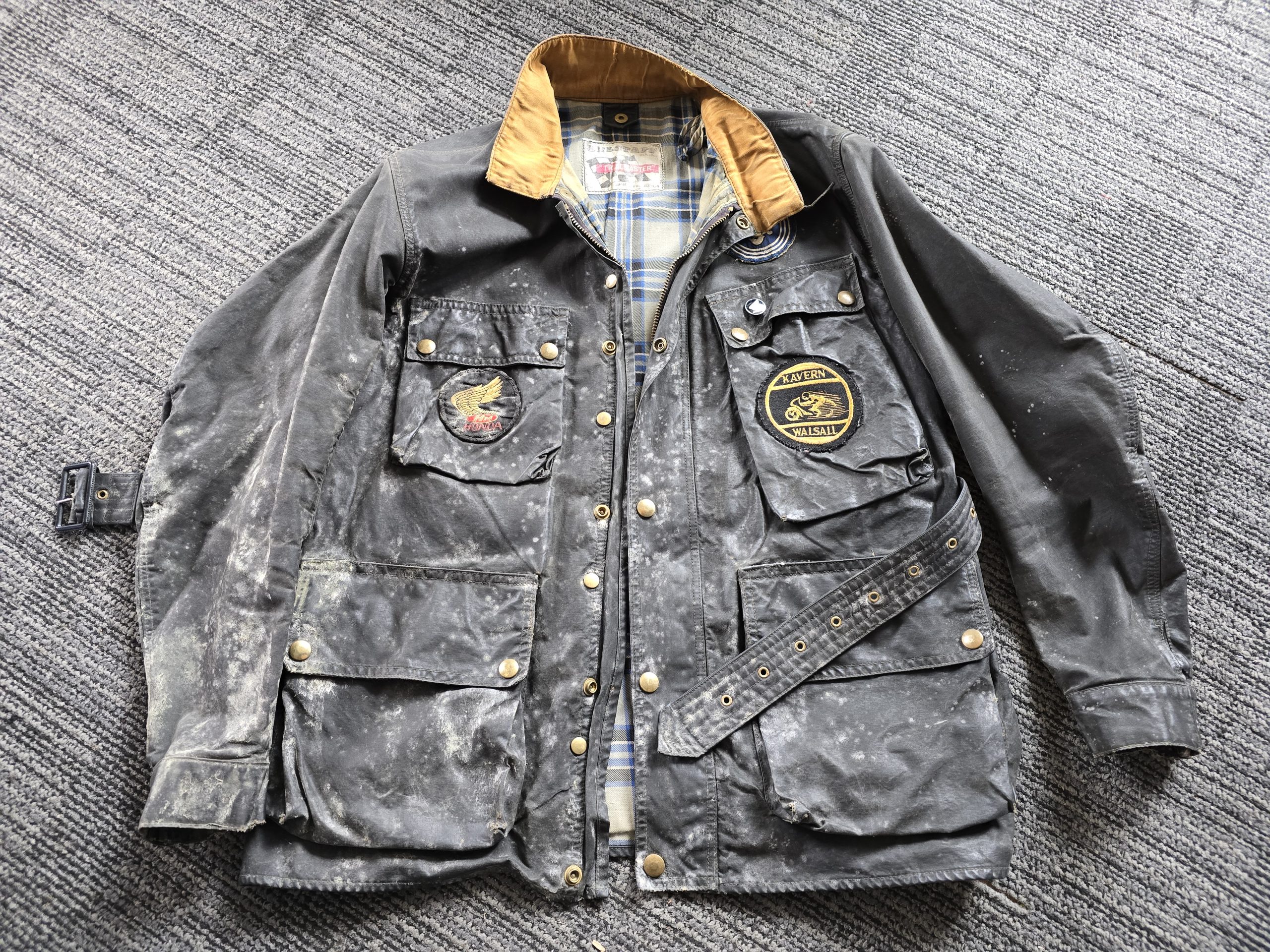 Mould-affected Belstaff jacket before specialist cleaning and restoration